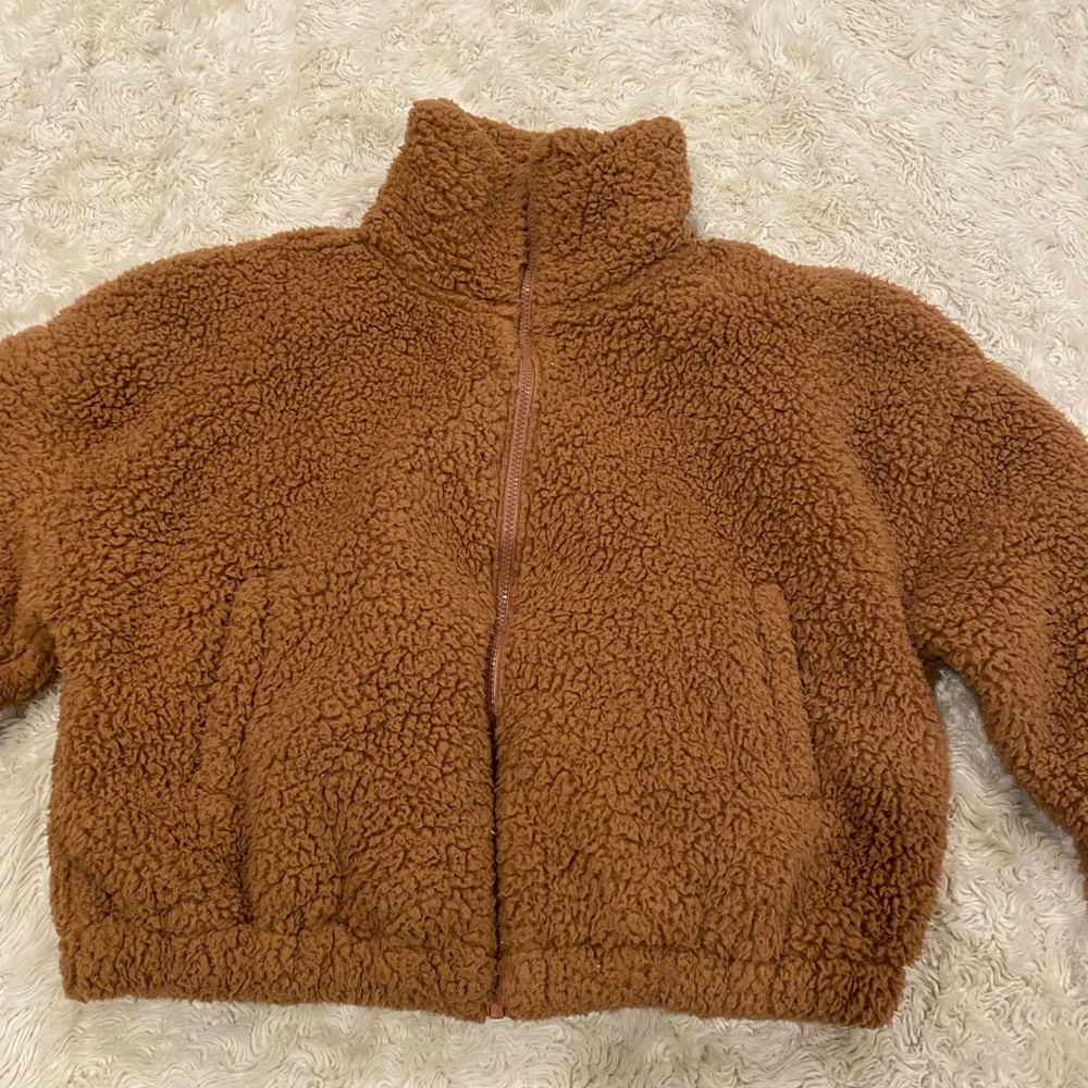 i’m selling a fluffy brown XS jacket from Sonoma.